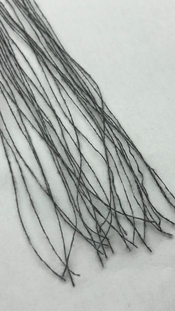 一种具有弧圈结构的花斑锦纶空变复合丝的制备方法